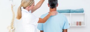 man receiving chiropractic neck adjustment